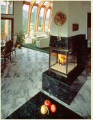 A Picture of an elegant marble fireplace